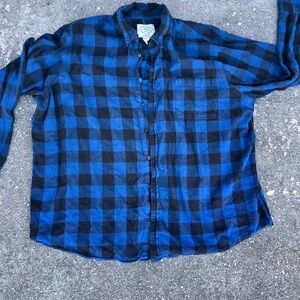 Blue and black flannel shirt.